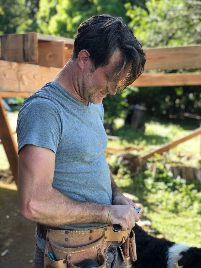 Chris at work with tool belt